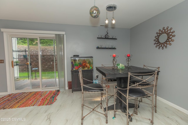 dining area with baseboards