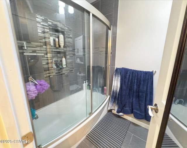 172 Ivy Ln, Danville, PA 17821 - full bathroom featuring shower / bath combination with glass door and tile patterned flooring