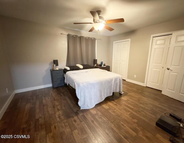 172 Ivy Ln, Danville, PA 17821 - bedroom with baseboards, dark wood-style flooring, multiple closets, and a ceiling fan