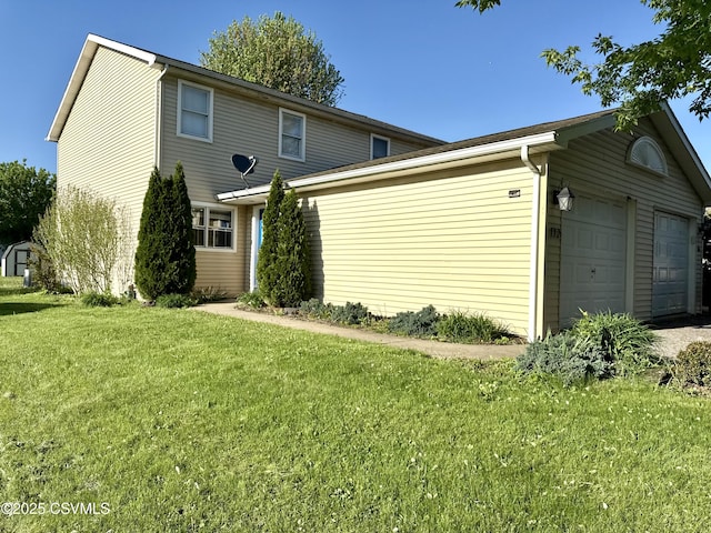 172 Ivy Ln, Danville, PA 17821 - view of front of house with a front yard, an attached garage, and an outbuilding