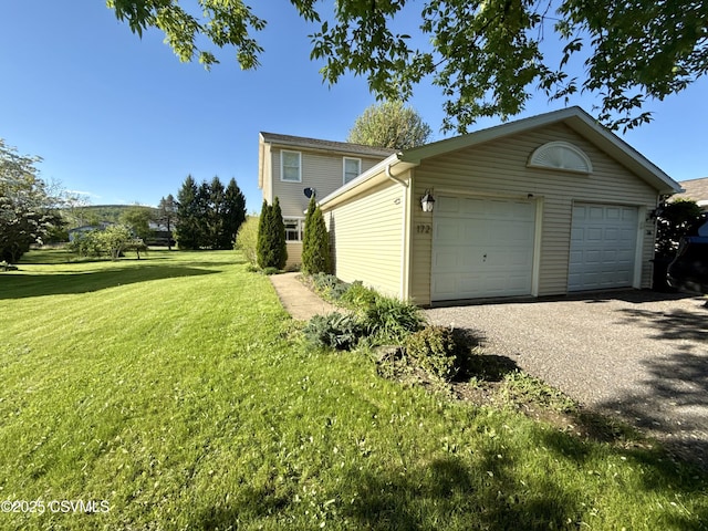 172 Ivy Ln, Danville, PA 17821 - view of side of home with an outdoor structure, a yard, and a garage