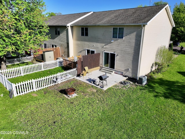 172 Ivy Ln, Danville, PA 17821 - back of house with a fire pit, a patio area, central AC, and roof with shingles
