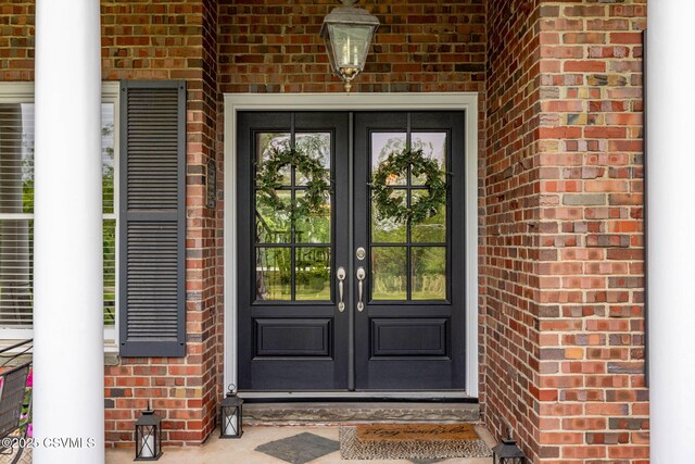 304 Hardscrabble Ln, Lewisburg, PA 17837 - doorway to property with french doors and brick siding