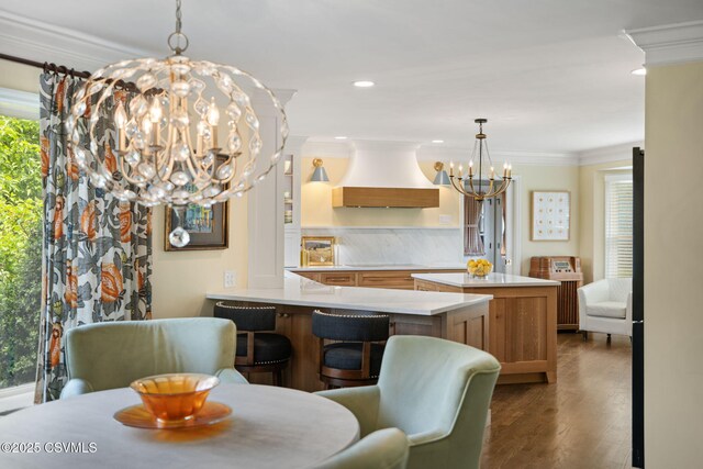 304 Hardscrabble Ln, Lewisburg, PA 17837 - dining space with a chandelier, crown molding, dark wood-type flooring, and recessed lighting