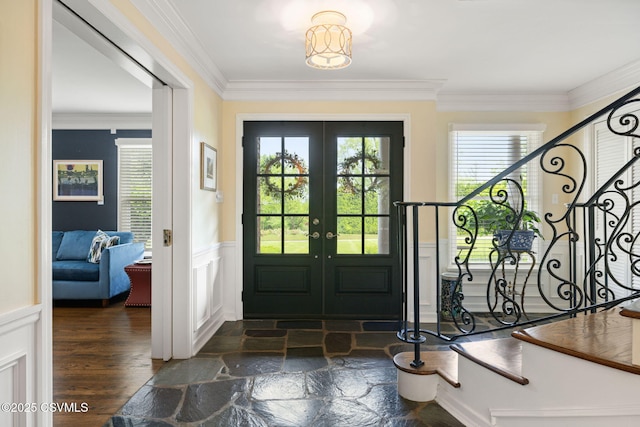 304 Hardscrabble Ln, Lewisburg, PA 17837 - foyer entrance featuring wainscoting, a decorative wall, crown molding, stairs, and french doors