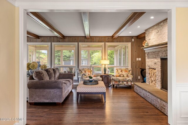 304 Hardscrabble Ln, Lewisburg, PA 17837 - living room with wood finished floors, beamed ceiling, wooden walls, a brick fireplace, and recessed lighting