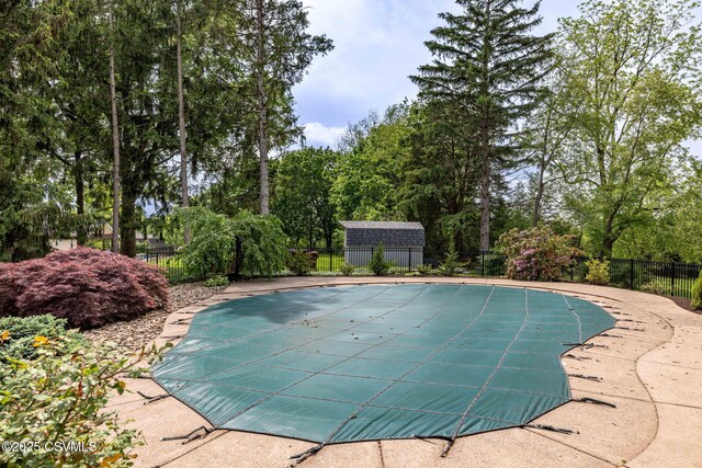304 Hardscrabble Ln, Lewisburg, PA 17837 - view of pool with a fenced backyard, an outdoor structure, and view of wooded area