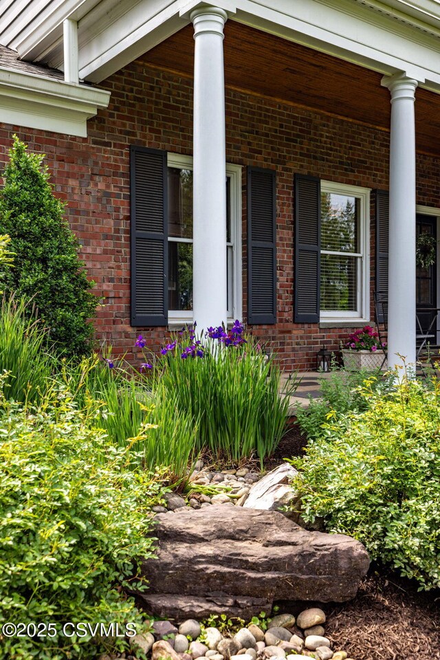 304 Hardscrabble Ln, Lewisburg, PA 17837 - doorway to property featuring brick siding and a porch