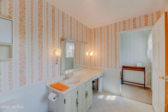bathroom featuring wainscoting and vanity