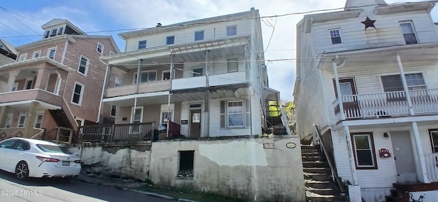 view of property with stairs