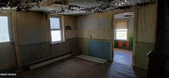 spare room with wainscoting