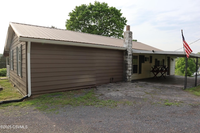 view of front facade featuring metal roof