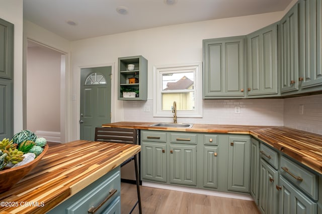 501 E 8th St, Berwick, PA 18603 - kitchen with butcher block countertops, a sink, and green cabinets