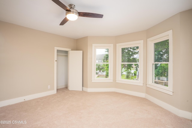 501 E 8th St, Berwick, PA 18603 - unfurnished bedroom featuring light carpet, multiple windows, and baseboards