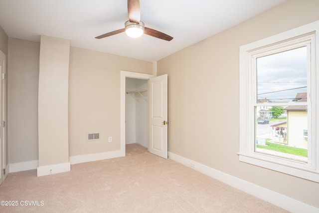 501 E 8th St, Berwick, PA 18603 - unfurnished bedroom featuring light colored carpet, a closet, a ceiling fan, and baseboards