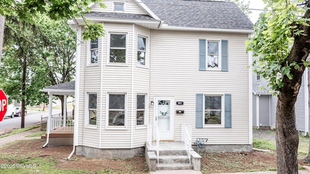 501 E 8th St, Berwick, PA 18603 - view of front of house featuring a shingled roof