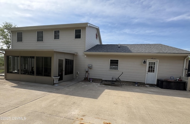 34 Fowlersville Rd, Bloomsburg, PA 17815 - back of property featuring a sunroom, a patio, and roof with shingles