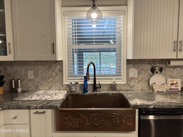 34 Fowlersville Rd, Bloomsburg, PA 17815 - kitchen featuring dishwasher, backsplash, a sink, white cabinetry, and dark stone counters