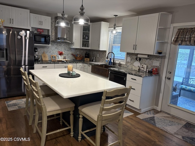 34 Fowlersville Rd, Bloomsburg, PA 17815 - kitchen featuring black appliances, a sink, dark wood-style flooring, and tasteful backsplash
