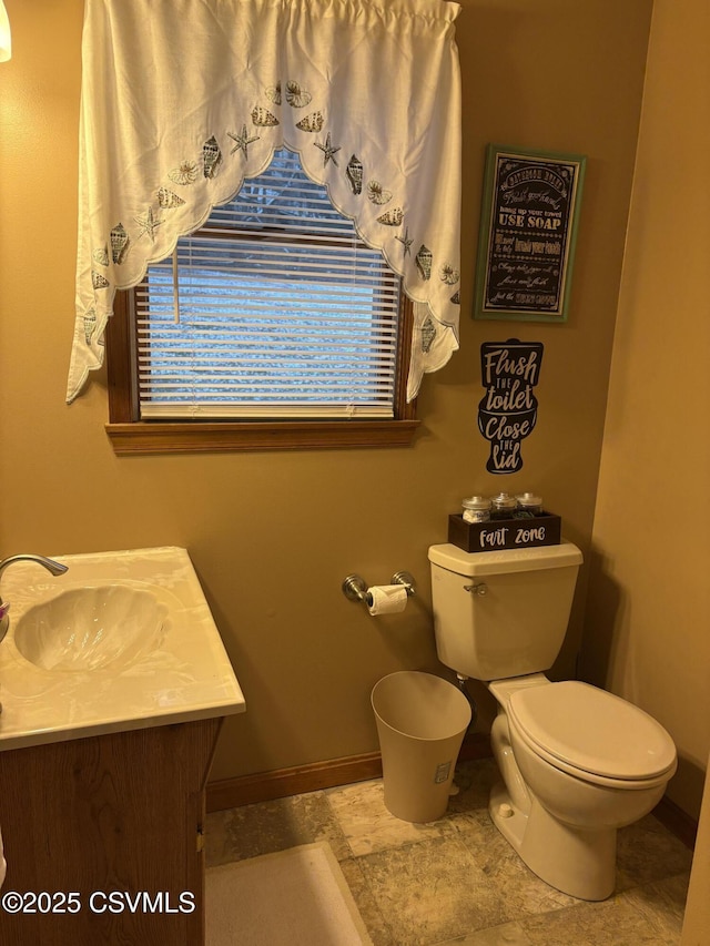 34 Fowlersville Rd, Bloomsburg, PA 17815 - half bathroom with baseboards, toilet, and vanity