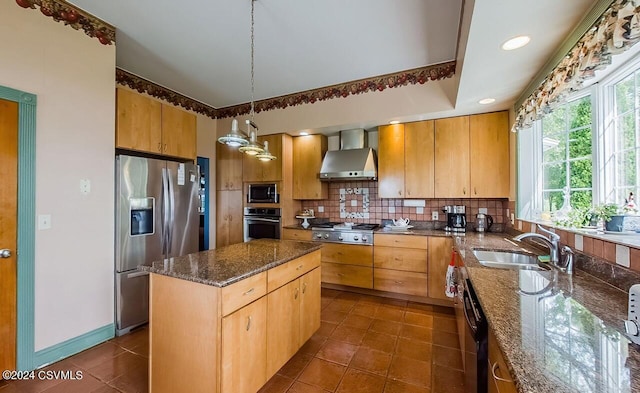 207 Klinger Hill Rd, Benton, PA 17814 - kitchen featuring appliances with stainless steel finishes, wall chimney exhaust hood, decorative backsplash, a sink, and a kitchen island