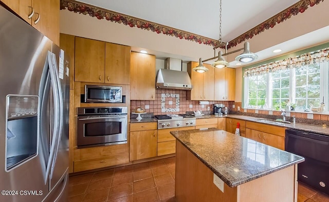 207 Klinger Hill Rd, Benton, PA 17814 - kitchen featuring stainless steel appliances, wall chimney range hood, backsplash, dark stone counters, and a kitchen island
