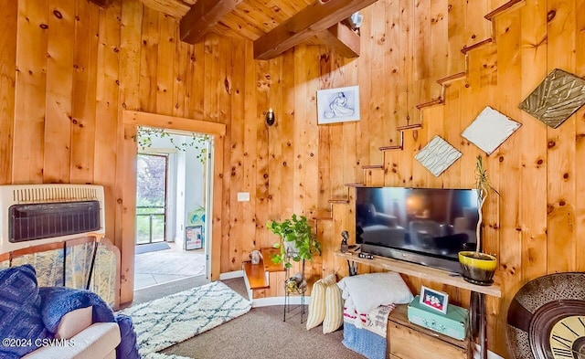 207 Klinger Hill Rd, Benton, PA 17814 - living room with heating unit, beam ceiling, wooden ceiling, carpet flooring, and wooden walls
