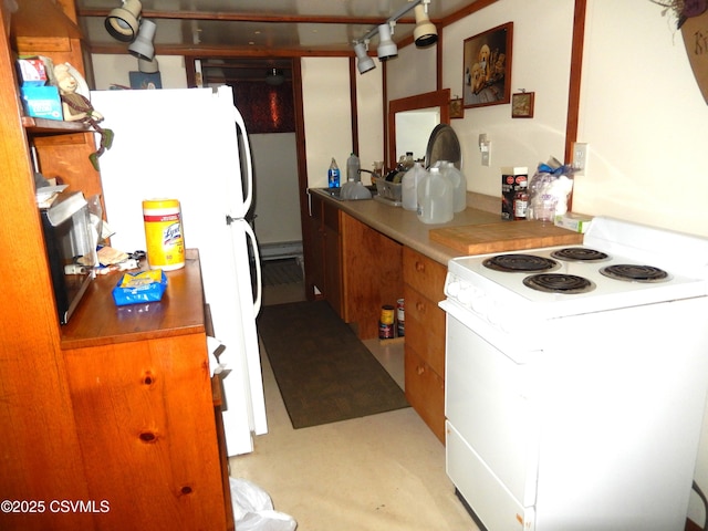 158 Apple Aly, Benton, PA 17814 - kitchen with white appliances and brown cabinets