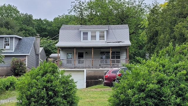 4523 State Route 61, Paxinos, PA 17860 - view of front of house featuring a porch, an attached garage, and a shingled roof
