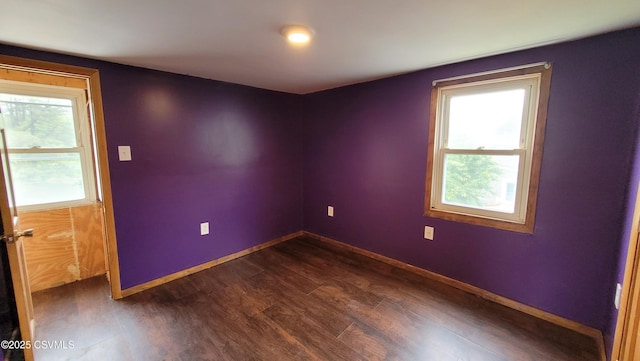 4523 State Route 61, Paxinos, PA 17860 - empty room featuring healthy amount of natural light, dark wood finished floors, and baseboards