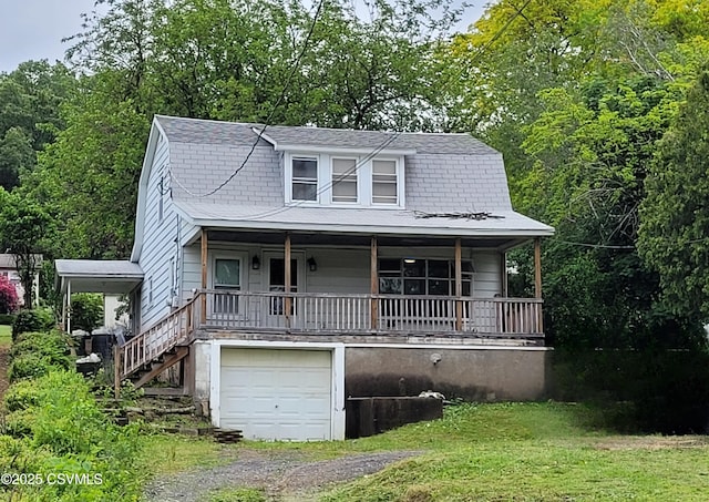 4523 State Route 61, Paxinos, PA 17860 - colonial inspired home with a porch, driveway, a gambrel roof, stairs, and a garage