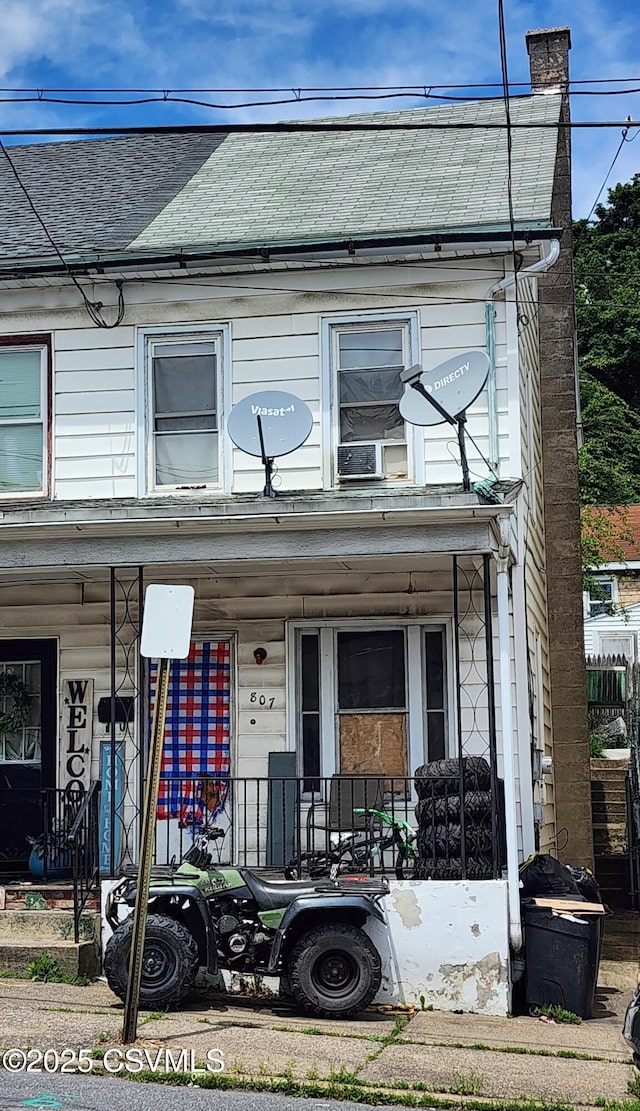 807 W Walnut St, Coal Township, PA 17866 - multi unit property with a porch, a chimney, and a shingled roof