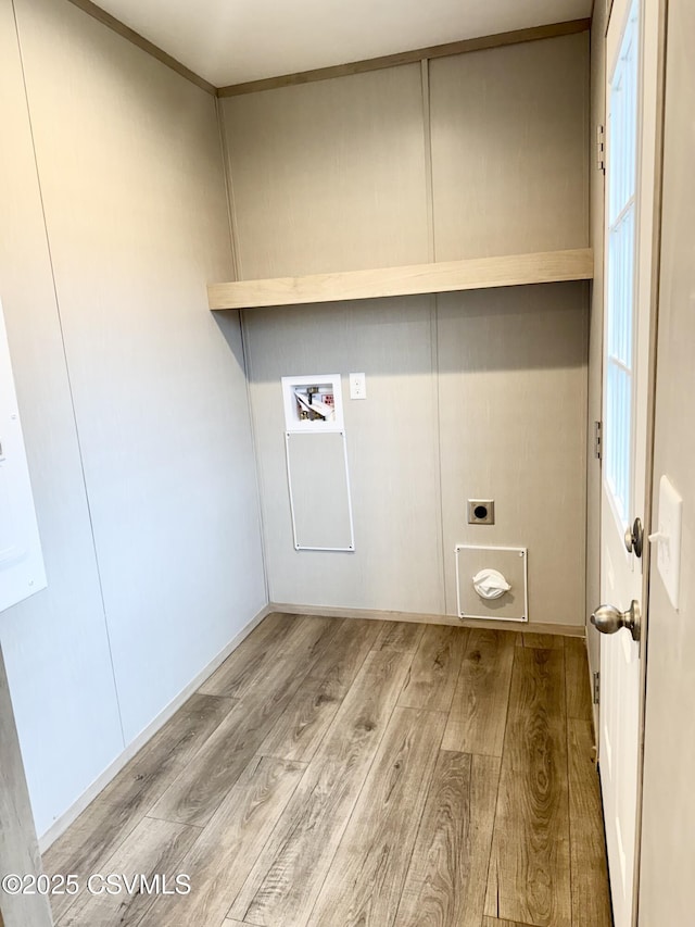 washroom featuring washer hookup, hookup for an electric dryer, and wood finished floors