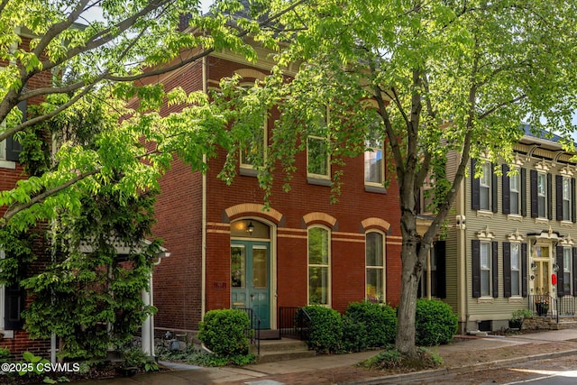 view of front of property with brick siding