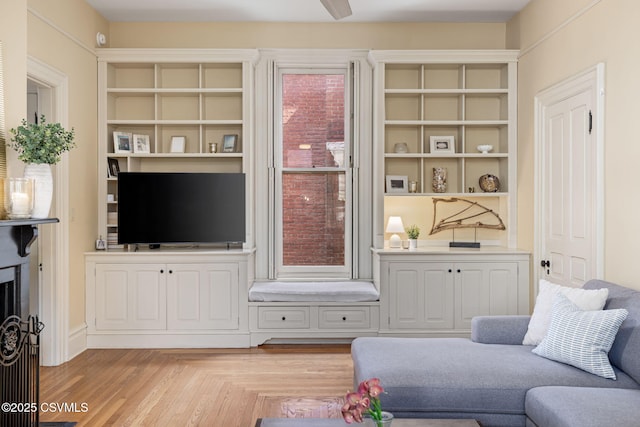 living area with built in shelves