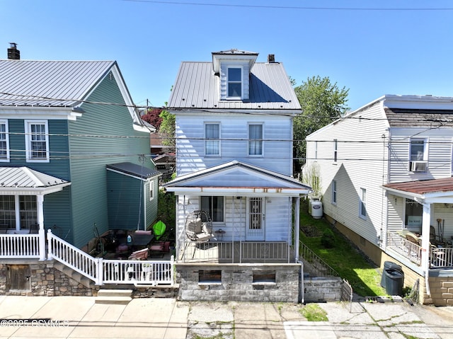 303 Melrose St, Marion Heights, PA 17832 - traditional style home with a porch, metal roof, a chimney, and cooling unit