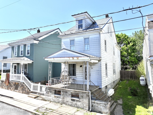 303 Melrose St, Marion Heights, PA 17832 - traditional style home with a porch, fence, and a chimney