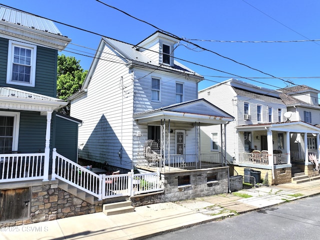 303 Melrose St, Marion Heights, PA 17832 - view of home's exterior featuring a porch and metal roof