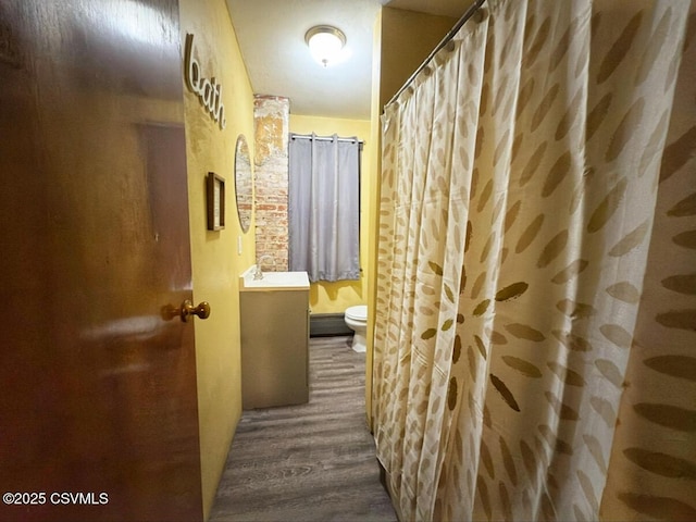 303 Melrose St, Marion Heights, PA 17832 - full bathroom with wood finished floors, toilet, and vanity