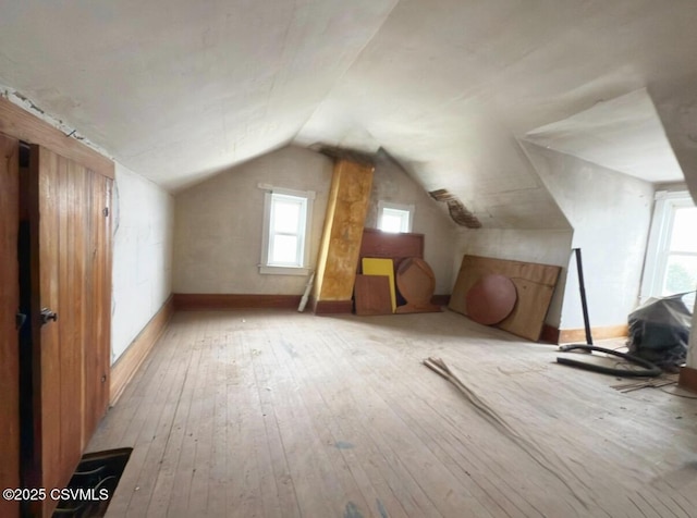 303 Melrose St, Marion Heights, PA 17832 - additional living space with light wood finished floors, lofted ceiling, and baseboards