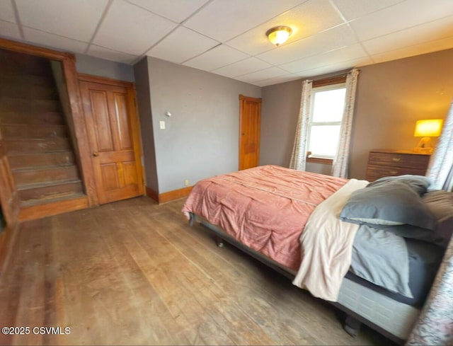 303 Melrose St, Marion Heights, PA 17832 - bedroom featuring a drop ceiling, baseboards, and wood finished floors