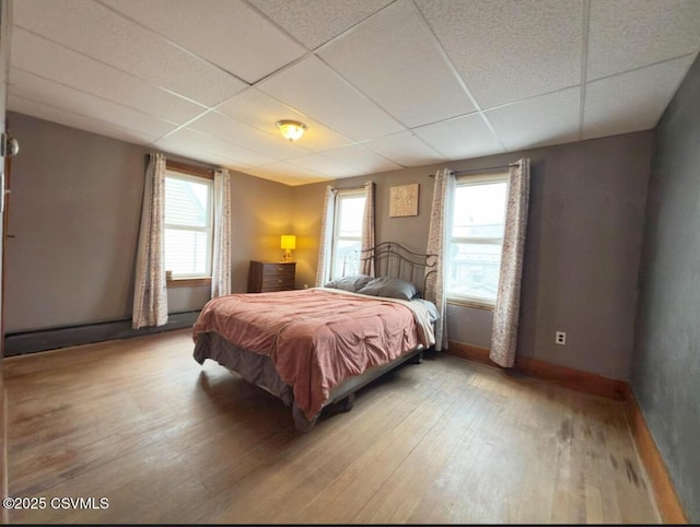 303 Melrose St, Marion Heights, PA 17832 - bedroom featuring a drop ceiling, wood finished floors, and baseboards