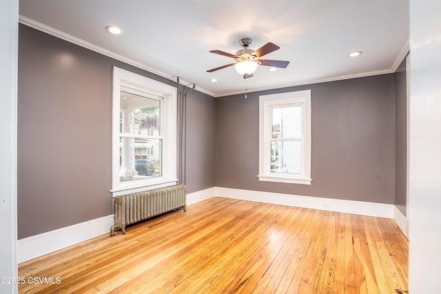 206 Orange St, Selinsgrove, PA 17870 - unfurnished room featuring radiator heating unit, plenty of natural light, light wood-type flooring, baseboards, and ornamental molding