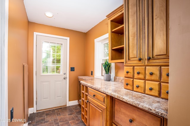 206 Orange St, Selinsgrove, PA 17870 - doorway featuring baseboards and stone finish floors