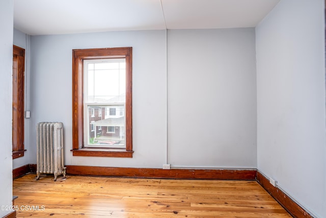 206 Orange St, Selinsgrove, PA 17870 - spare room with radiator, light wood-style floors, and baseboards