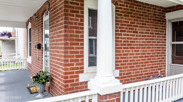206 Orange St, Selinsgrove, PA 17870 - view of exterior entry featuring brick siding and a porch