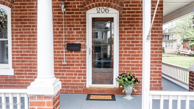 206 Orange St, Selinsgrove, PA 17870 - property entrance with brick siding and a porch