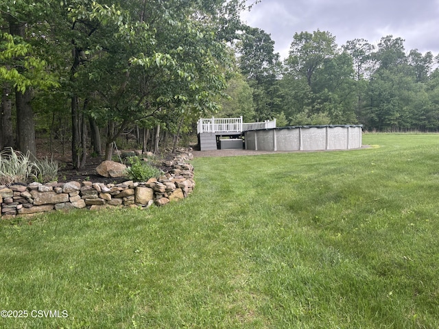 1874 Reading Tpke, Elysburg, PA 17824 - view of green lawn with a covered pool and a deck