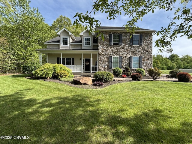 1874 Reading Tpke, Elysburg, PA 17824 - view of front of property with stone siding, a porch, and a front yard