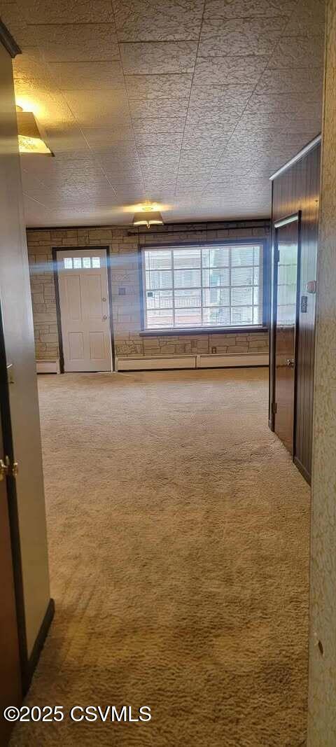 unfurnished room with carpet